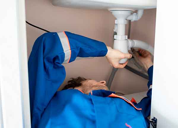 Emergency plumbing service in South Jersey with plumber responding to urgent repair.