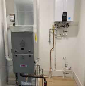 L.F. Fenimore Plumbing & HVAC in South NJ installing furnace, AC coil, and Navien tankless water heater
