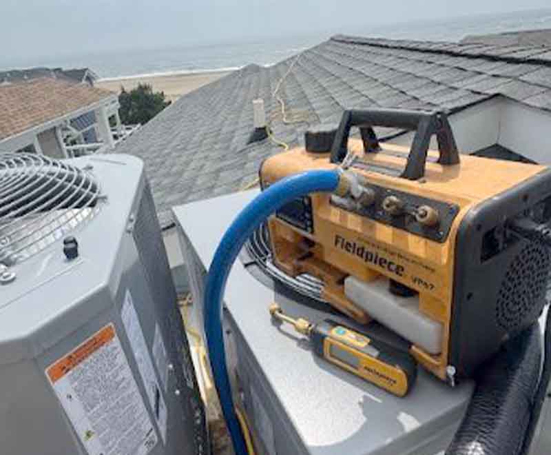Air conditioning unit maintenance and refrigerant charging by L.F. Fenimore Plumbing and HVAC in South New Jersey.